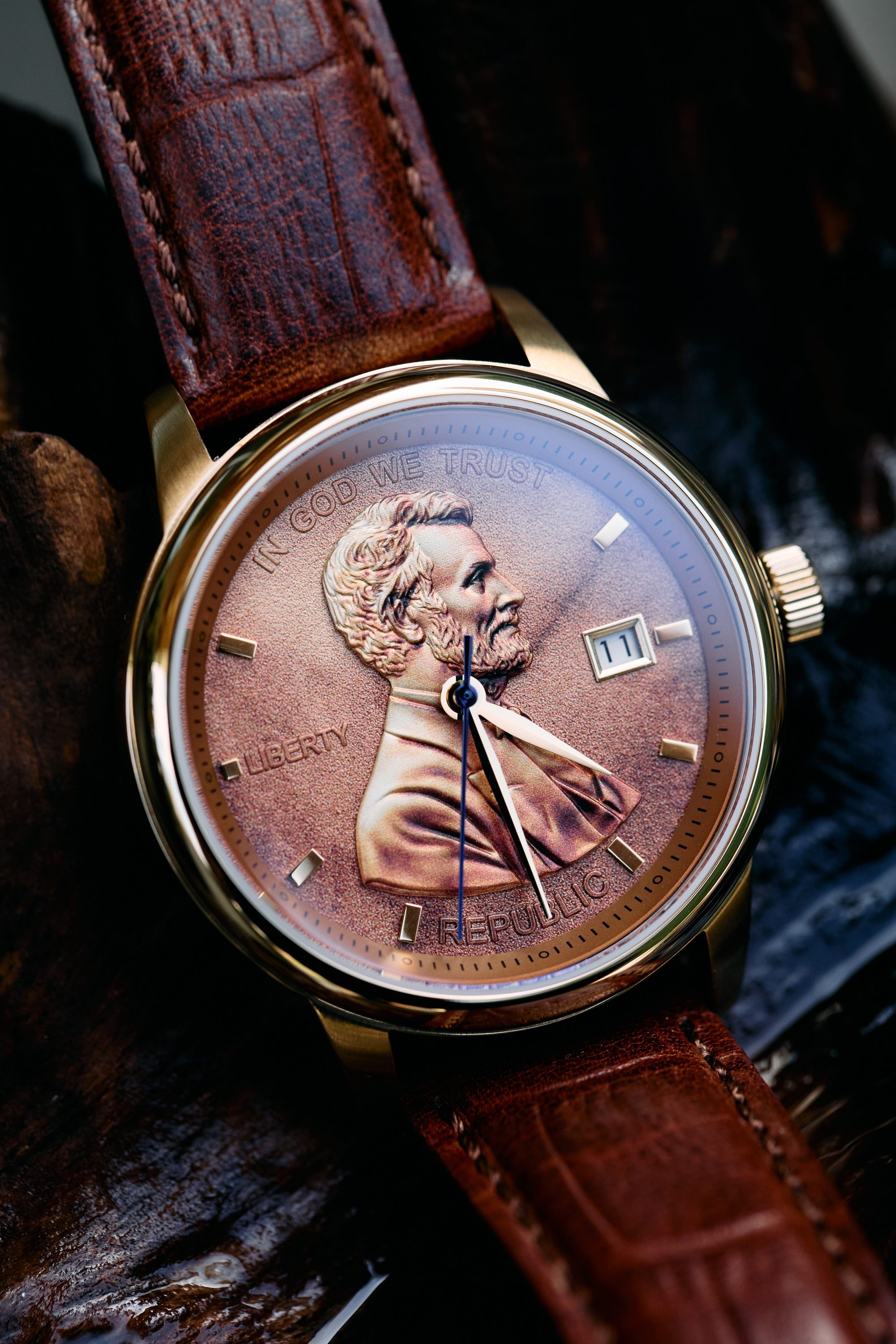 The Lincoln — the sculpted Lincoln dial in aged bronze, photographed in detail
